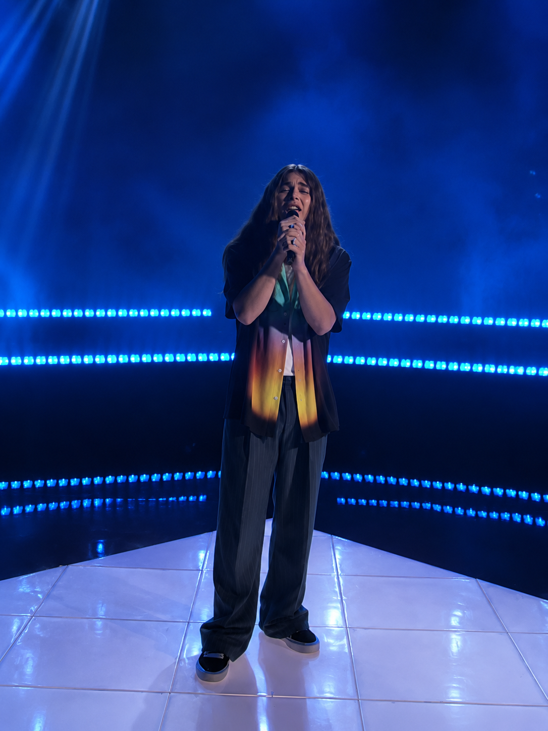 Jourdan Blue performing Biblical under blue lights on the America's Got Talent quarterfinals stage